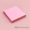 Macro view of a square pink sticky note pad measuring 7.6x7.6cm with a smooth texture - 7.6x7.6cm / Pink