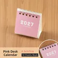 Compact minimalist pink 2027 desk calendar with spiral binding, dimensions 6.3x3x7cm - 2027 / Pink