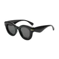 Trendy round bubble thick frame sunglasses with sleek black finish and gold accents. - Black Frame Black Grey Lens