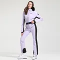 Combinaison de ski une pièce lavande pour femme avec capuche en fourrure et coupe slim - M / Ensemble (Style 2314) / Mauve Clair