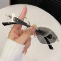 Modern rimless diamond-cut sunglasses featuring grey gradient lenses and gold metal frame - Black Photochromic White to Grey