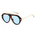 Chic tortoise shell pilot sunglasses featuring light blue tinted lenses and gold metal arms - Leopard Frame Blue Lens