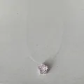 Primer plano de colgante de circonita rosa en forma de estrella con collar de hilo - Collar de Estrella Rosa