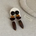 Close-up of retro geometric wooden patchwork drop earrings with dark brown wood finish - Style 3 Earrings