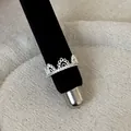 Close-up detail of an elegant silver lace hollow crown ring set with small cubic zirconia - Crown Hollow Pave Rhinestone Style (Style 3 Ring)