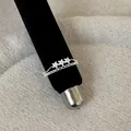 Close-up detail of a silver lace openwork ring featuring three sparkling stars - Pentagram Double Layer Style (Style 4 Ring)