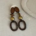 Macro detail view of retro style wooden and gold bead patchwork statement earrings - Style 13 Earrings