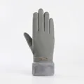 Close-up of grey winter thermal full-finger glove with faux fur cuff and fashion detail - Small Gold Label Style / Gray