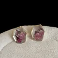 Macro view of vintage hexagonal earrings with pink dried flowers in clear resin. - Irregular Purple Flower Earrings