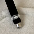 Detailed macro view of vintage silver hollow lace crown ring with sparkling rhinestones - Palace Crown Lace Style (Style 26 Ring) / Silver