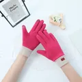 Detail of pink touchscreen gloves for women featuring warm Dralon fleece material - Touchscreen Ribbed Style / Rose Red