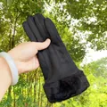 Detailed view of black faux suede winter gloves with thick faux fur trim on the wrist. - Three-Strand / Black