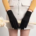 Elegant black velvet touchscreen winter gloves for women featuring button cuff detail - Black