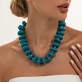 Chunky turquoise resin bead necklace with gold CCB spacers for a bold fashion statement. - Lake Blue