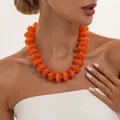 Auffällige orangefarbene Harzperlenkette mit goldenen CCB-Abstandhaltern für den Sweet-Cool-Look - Orange