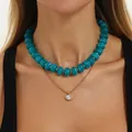 Vibrant teal resin bead necklace layered with a gold stainless steel zircon pendant chain - Layered Double Necklace (7563) / Gold + Lake Blue