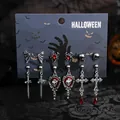 Detailansicht von Halloween-Ohrring-Set mit Fledermäusen Totenköpfen und Kreuzen - Fledermaus Rubin Totenkopf Zauberspiegel Stil (06674)