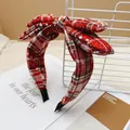 Festive red plaid Christmas bow headband with a wide fabric design for women and girls - Red White