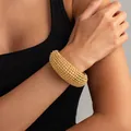 Bracciale rigido vintage in maglia intrecciata dorata con design metallico traforato - 01 Bracciale Oro (3177) / Oro