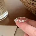 Elegant silver ribbon bow ring featuring a delicate beaded band and sparkling zircon stones - Bowknot Style (U5-51) / Silver