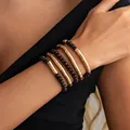 Ensemble de bracelets empilés avec tubes dorés et perles en bois sombre - Bracelet (7287K4) / Or