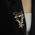 Gold safety pin brooch with starfish, seashell charms and faux pearls on black blazer - Gold Ocean Theme Style (00408)