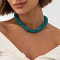 Bohemian style blue marbled resin bead necklace with gold stainless steel spacers on model - Dark Green Necklace (7957)