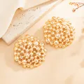 Detail of hollow mesh honeycomb stud earrings in gold liquid texture finish - Stud Earrings (04060) / Gold