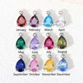 Colección de doce dijes de piedra de nacimiento de circón en forma de pera 5x7mm para joyas - Circonia Granate de Enero / Color acero