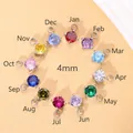 Set of 12 colorful 4mm birthstone zircon pendants with steel settings for DIY jewelry - April White Zirconia / Steel