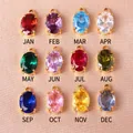 Colección de 12 dijes de circonia de piedra natal ovalada en varios colores - Circonia Rojo Granate (Enero) / 6*8 Óvalo / Dorado
