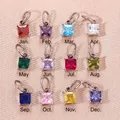 Juego de doce colgantes cuadrados con piedras de nacimiento de circonita para joyería DIY - Enero Rojo Granate (Circonia) / 4x4mm (Con Anillo) / Color acero