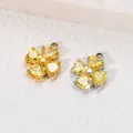 Pendaglio a quadrifoglio con zircone giallo in finiture oro e argento per gioielli - Zirconia Dorata
