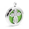 Close-up of stainless steel aromatherapy locket with hollow cross and green pad - Pendant with 10 Pads Only (Without Chain) / Steel Color (ai-0000)