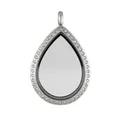 Close-up of a teardrop stainless steel locket pendant featuring a crystal border - Rhinestone Style / Silver