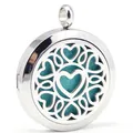 Colgante difusor de aromaterapia de acero inoxidable con diseño de corazón calado - Corazón / Colgante + 10 Almohadillas de Algodón