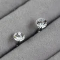 Pair of minimalist clear crystal birthstone stud earrings with stainless steel posts - White (April)