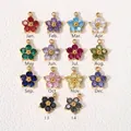 Set de 14 colgantes de flores de acero inoxidable con circonitas de colores para joyas DIY - Estilo Granate (Enero) / 1 Pieza / Dorado