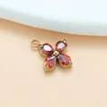 Eleganter vierblättriger Kleeblatt-Anhänger mit roten Zirkonsteinen und Goldfassung. - Gold Garnet Red