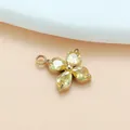 Vierblättriger Kleeblatt-Anhänger mit gelben Zirkonia-Steinen aus vergoldetem Stahl. - Gold gold zirconium