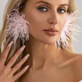 Oversized elegant pink ostrich feather stud earrings with a central sparkling crystal - Pink