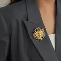 Elegant vintage style golden sun goddess relief brooch pinned on a professional grey blazer lapel - Sun Goddess Relief (0410) / Gold