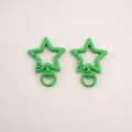 Pair of green star-shaped lobster clasps for DIY keychain crafting and holiday accessories. - Five-Pointed Star (FKY124) / 1 Piece/Pack (31x41x3.5mm) / Green