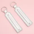 Pair of metallic silver textured leather keychains with circular rings for DIY gifts - 15cm 1 Piece/Pack / Silver