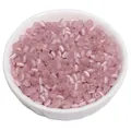High quality pink glass cat-eye donut beads in a white bowl for DIY jewelry craft - Dusty Pink