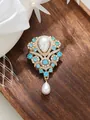 Detailed view of a vintage French brooch with blue crystals and a teardrop pearl - Sky Blue Style (A23-173)