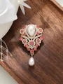 Detailed macro shot of an elegant vintage brooch with pink crystals and teardrop pearls - Pink Style (A23-176)