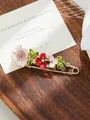 Close-up of elegant floral enamel brooch with colorful petals and crystal accents - Pink and Red Tulip Style (A2-11)