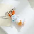 Schattige 3D hars Corgi hond broche hanger in liggende pose voor tassen en kleding - Corgi Stijl (A22-159)