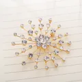 Sparkling rhinestone snowflake brooch pin in gold plating for elegant apparel styling - Gold
